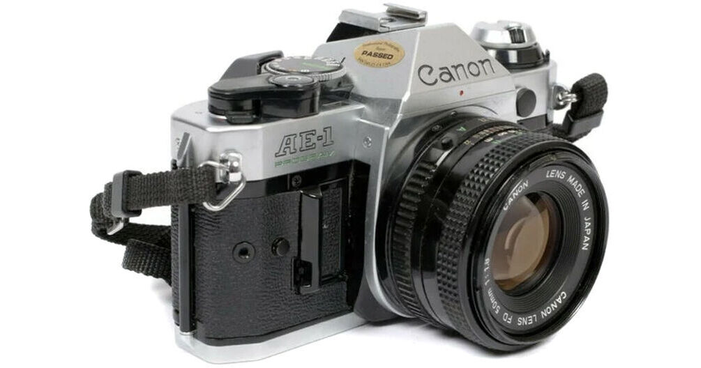 Canon AE-1 Program 35mm SLR Camera with 50mm f/1.8 FD Lens