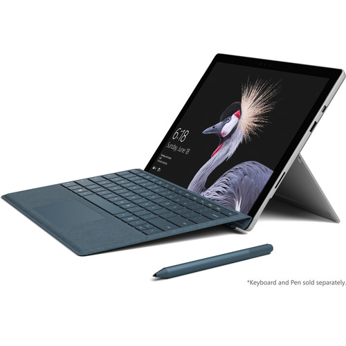 Microsoft Surface Pro 10 with keyboard and stylus on a white desk