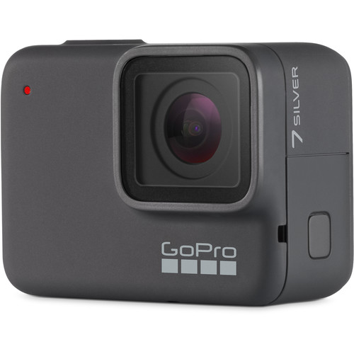 A black GoPro camera is set at an angle facing out on a white background. The front and left hand side are visible.